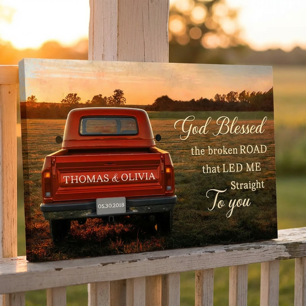 Personalized sign with a red truck and romantic message against a sunset landscape