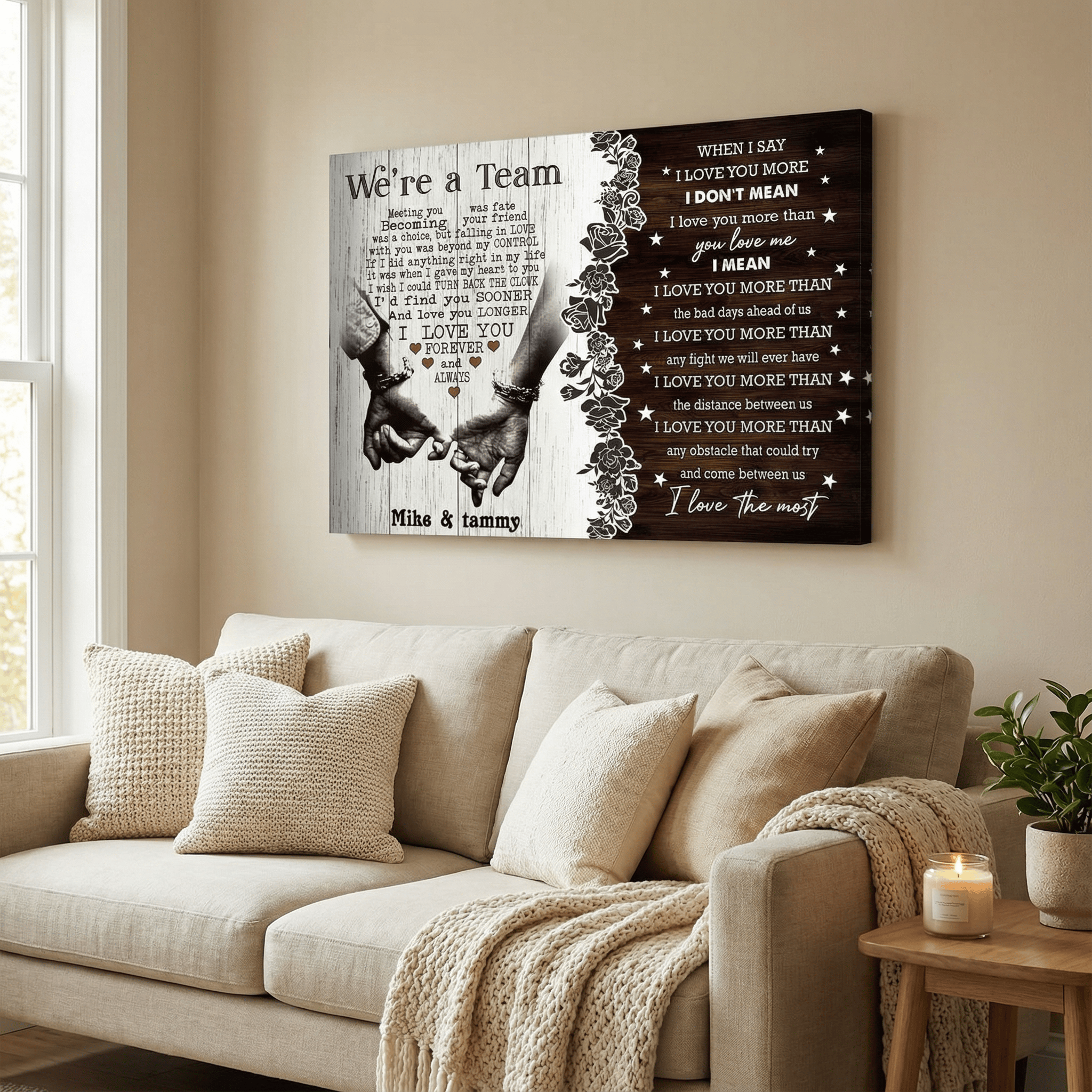Decorative wall art with hands holding hands and text in a living room setting.