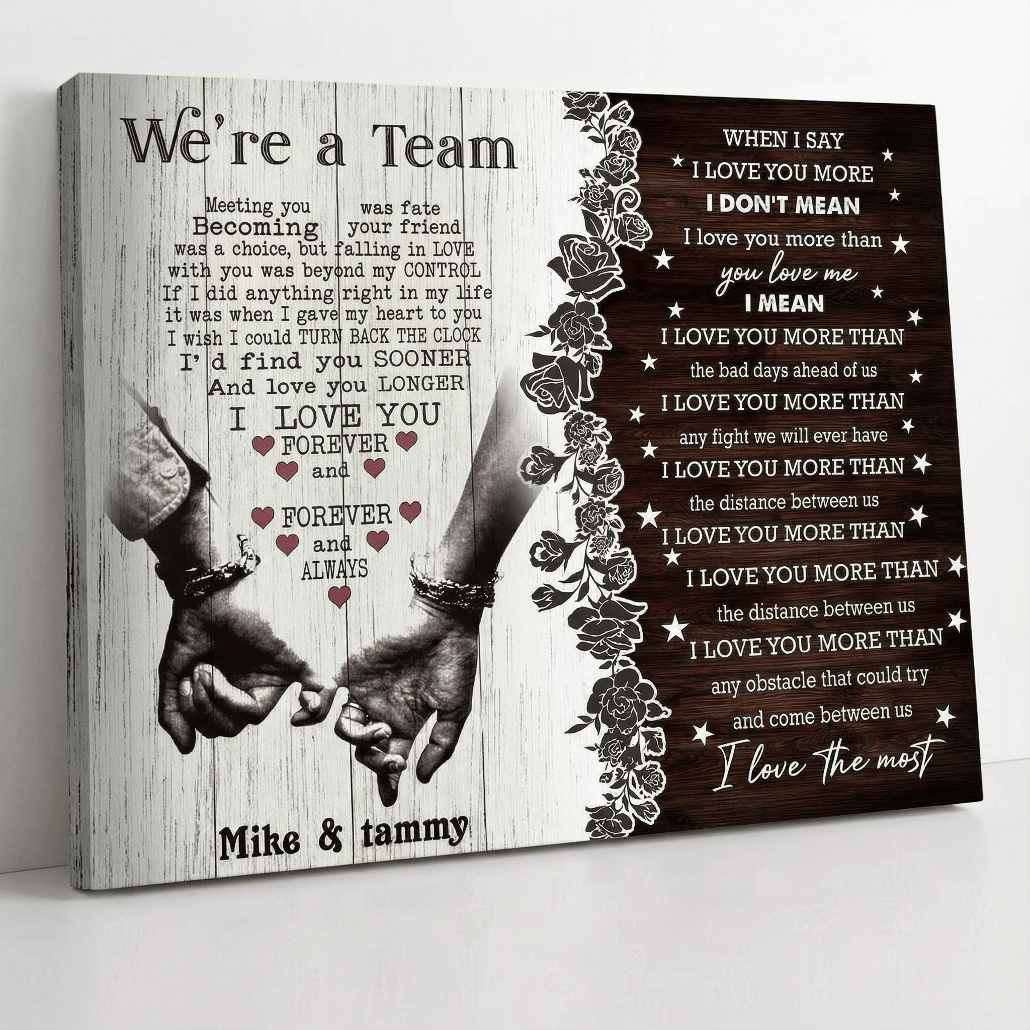 Canvas print with hands holding each other and romantic text on a wooden background.