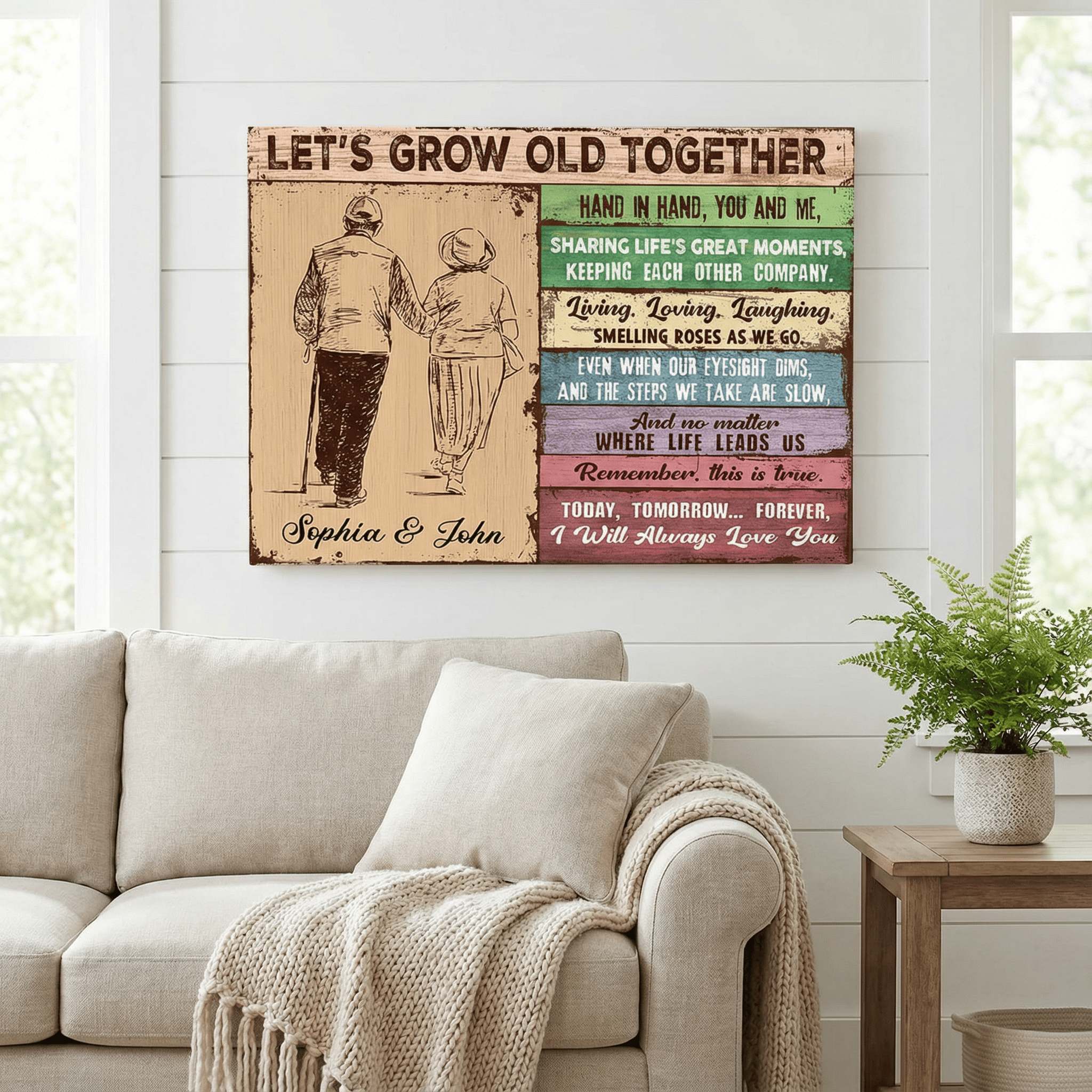 Decorative wall art with text and illustration of a couple holding hands in a living room.