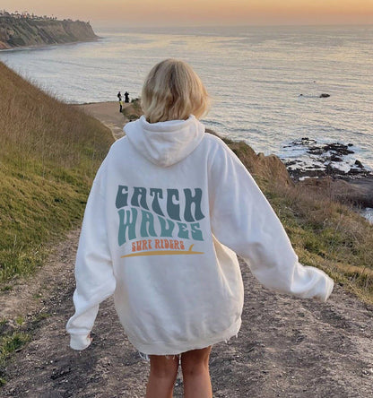 Catch Waves Sunset Surfer Hoodie – Oversized Beach Sweatshirt